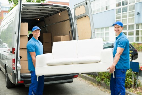 Moving van and residential buildings in Limehouse