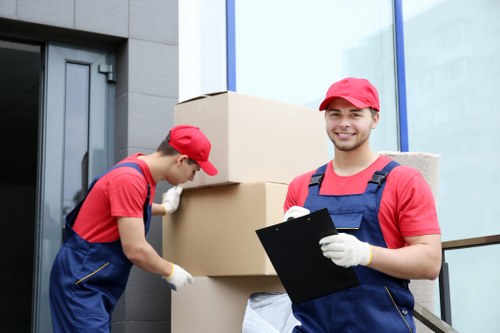 Removal team planning a move in Limehouse near riverside apartments