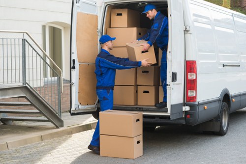Professional moving van helping with furniture transport in Limehouse