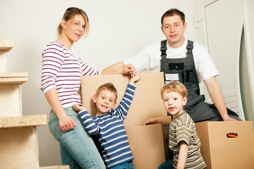 Preparing boxes and furniture for a Limehouse moving truck