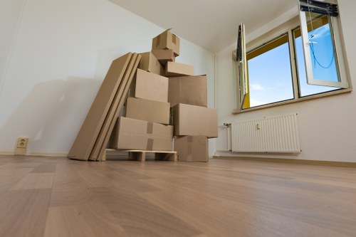 House removal team planning a move in Limehouse near local flats and streets