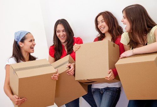 Local Limehouse moving truck handling furniture and boxes