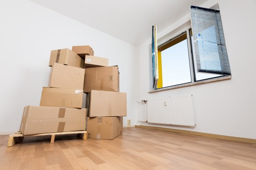 Local moving crew handling apartment access and furniture in Limehouse