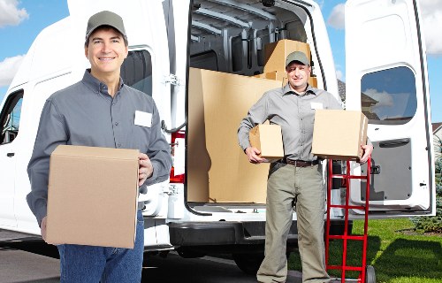 Office desks and equipment prepared for transport in East London