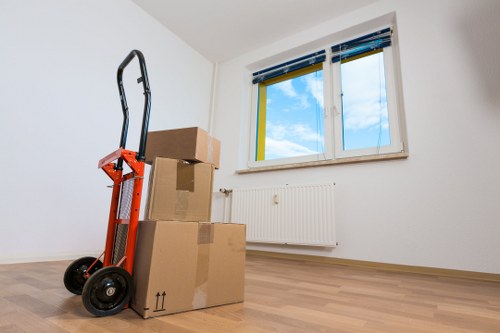 Staff trained in safe lifting and packing methods for a Man With Van Limehouse move